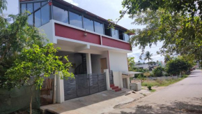 A spacious AC room with wide Balcony -Karimbumel House a perfect place for yoga practicioners
